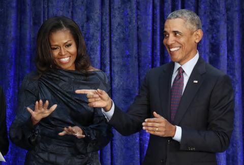 Former U.S. President Barack Obama and former first lady Michelle Obama acknowledge guests during the unveiling of their portraits at the Smithsonian’s National Portrait Gallery in Washington, U.S., February 12, 2018. PHOTO BY REUTERS/Jim Bourg