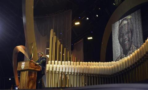 Tanzania's President Jakaya Mrisho Kikwete speaks during the funeral ceremony for former South African President Nelson Mandela in Qunu