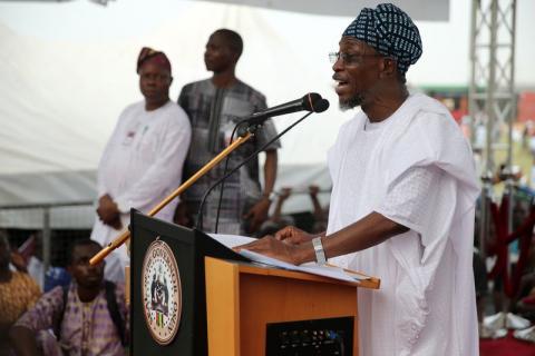 Ogbeni Rauf Aregbesola reads a speech in Osogbo, southwest Nigeria. PHOTO BY REUTERS/Akintunde Akinleye