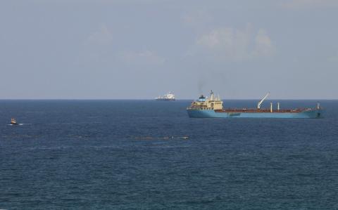 An oil tanker is seen at the port and Zawiya Oil Refinery, 55 km (34 miles) west of the city of Tripoli