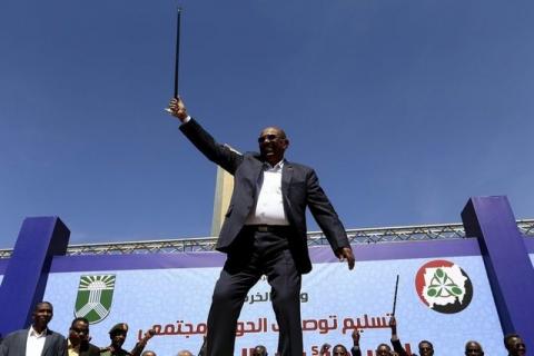 Sudan's President Omar Hassan Ahmad al-Bashir waves to his supporters during a National Dialogue campaign event in Khartoum, February 8, 2016. PHOTO BY REUTERS/Mohamed Nureldin Abdallah