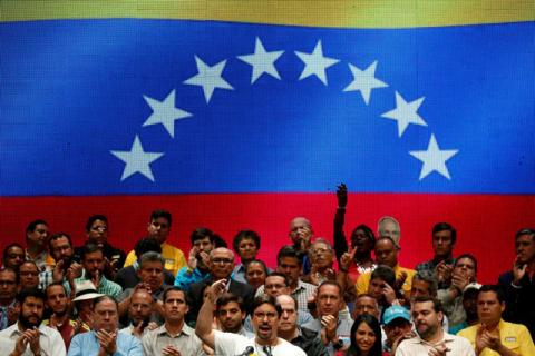 Freddy Guevara (C), first Vice-President of the National Assembly and lawmaker of the Venezuelan coalition of opposition parties (MUD), talks to the media during a news conference in Caracas, Venezuela, July 17, 2017. PHOTO BY REUTERS/Carlos Garcia Rawlins