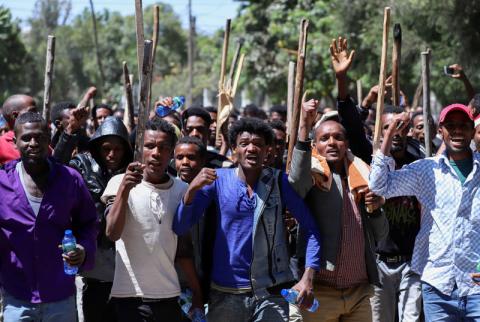 Oromo youth chant slogans during a protest in-front of Jawar Mohammed's house, an Oromo activist and leader of the Oromo protest in Addis Ababa, Ethiopia, October 24, 2019. PHOTO BY REUTERS/Tiksa Negeri