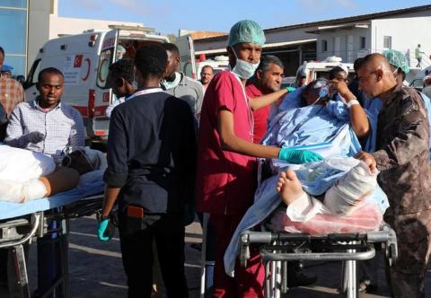 Paramedics assist Turkish workers injured in an explosion in Afgoye town, before they board a Turkish military cargo plane at the Aden Abdulle International Airport in Mogadishu, Somalia, January 21, 2020. PHOTO BY REUTERS/Feisal Omar