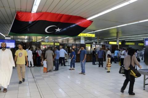 Passengers are seen in a hall at Tripoli's Mitiga airport, after clashes between rival militias closed down Tripoli International, Airport July 27, 2014. PHOTO BY REUTERS/Hani Amara