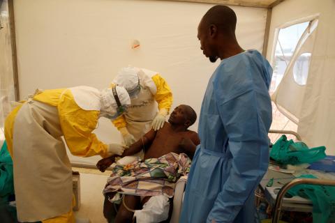 Medical stuff and an Ebola survivor treat an Ebola patient in a medical centre in Beni, Democratic Republic of Congo, March 31, 2019. PHOTO BY REUTERS/Baz Ratner