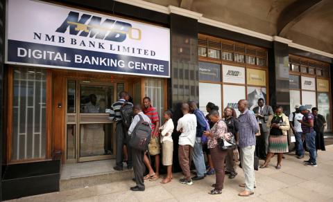 People queue outside a bank in Harare, Zimbabwe, February 22, 2019. PHOTO BY REUTERS/Mike Hutchings