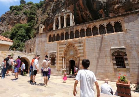 People are seen at the Monastery of Saint Anthony of Qozhaya in the heart of the Qadisha valley, in Zgharta district, Lebanon, June 23, 2019. PHOTO BY REUTERS/Imad Creidi