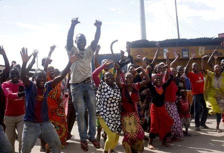 People celebrate in a street in Bujumbura, May 13, 2015. PHOTO BY REUTERS/Goran Tomasevic