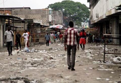 People walk through a street amid a general strike called by the opposition to press President Joseph Kabila to step down in December, in Kinshasa, the Democratic Republic of Congo, October 19, 2016. PHOTO BY REUTERS/Kenny Katombe