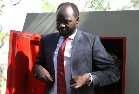 Peter Biar Ajak, the South Sudan country director for the London School of Economics' International Growth Centre based in Britain, arrives at the courtroom in Juba, South Sudan, March 21, 2019. PHOTO BY REUTERS/Stringer