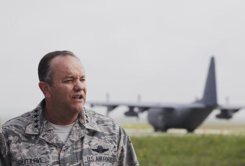 NATO's top military chief, General Philip Breedlove, speaks about the conflict in Syria during a news conference at Pristina Military Airport 