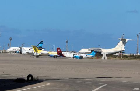 Airplanes are seen at Mitiga airport, after an air strike in Tripoli, Libya, April 8, 2019. PHOTO BY REUTERS/Hani Amara