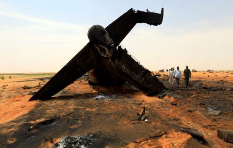 A Sudanese military plane after it crashed. PHOTO BY REUTERS/Mohamed Nureldin Abdallah