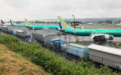 A row of three green 737 MAX jetliners sit parked on the tarmac at Renton Municipal Airport in Renton, Washington, U.S. May 16, 2019. PHOTO BY REUTERS/Eric Johnson