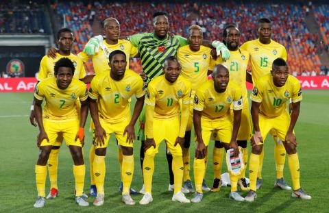 Zimbabwe players pose for a team group photo before the match. PHOTO BY REUTERS/Mohamed Abd El Ghany