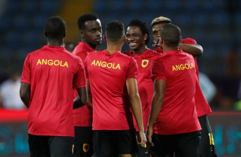 Players of Angola warm up. PHOTO BY REUTERS/Amr Abdallah Dalsh