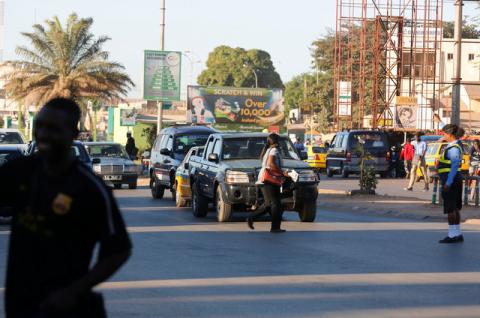 A police woman controls traffic at Kairaba avenue in Banjul, Gambia, January 24, 2017. PHOTO BY REUTERS/Thierry Gouegnon