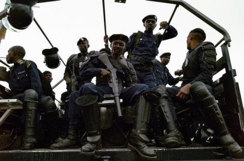 Congolese police patrol in their truck along an intersection near Echangeur de Limete as opposition activists march to press President Joseph Kabila to step down in the Democratic Republic of Congo's capital Kinshasa, September 19, 2016. PHOTO BY REUTERS/Stringer