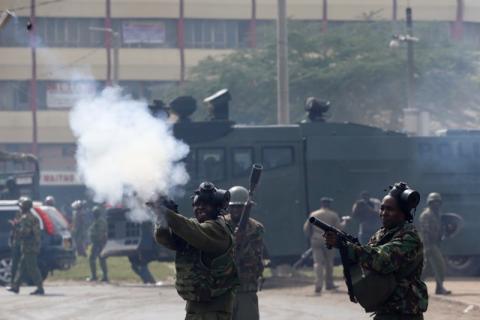 Anti-riot police fire tear gas to disperse supporters of Kenyan opposition National Super Alliance (NASA) coalition in Nairobi, Kenya, November 17, 2017. PHOTO BY REUTERS/Baz Ratner