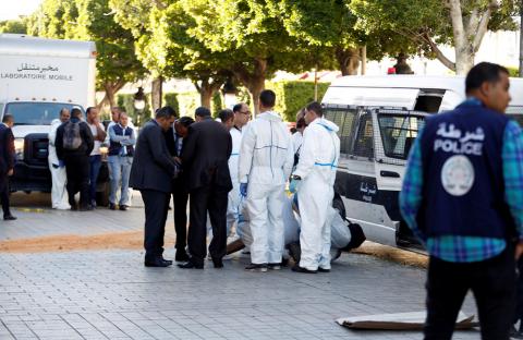 Police secure the area as forensic experts work near the site of an explosion in the center of the Tunisian capital Tunis, Tunisia, October 29, 2018. PHOTO BY REUTERS/Zoubeir Souissi