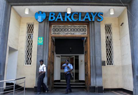 Kenyan police officers secure the entrance of the banking hall after they seized fake currency in a personal safety deposit box at the Queensway branch of Barclays Bank of Kenya, in downtown Nairobi, Kenya March 19, 2019. PHOTO BY REUTERS/Njeri Mwangi