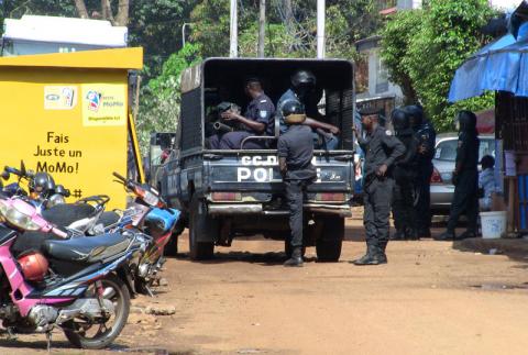 Police officers deploy outside a court in Conakry, Guinea, October 22, 2019. PHOTO BY REUTERS/Saliou Samb