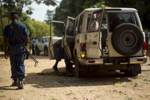 A policeman walks at the crime scene where Burundian General Athanase Kararuza was attacked and killed by unknown gunmen in Ntahangwa commune, north of the capital Bujumbura, April 25, 2016. PHOTO BY REUTERS/Evrard Ngendakumana