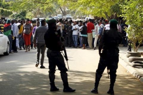 Policemen stand guard as supporters of Indigenous People of Biafra (IPOB) in Abuja, Nigeria, December 1, 2015. PHOTO BY REUTERS/Afolabi Sotunde