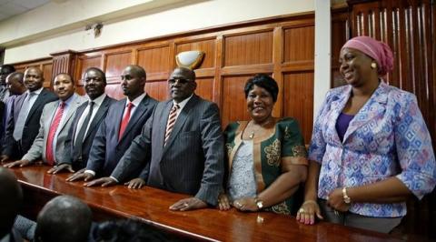 Kenyan politicians Aisha Jumwa, Florence Mutua, Johnstone Muthama, Junet Mohammed, Timothy Bosire, Ferdinand Waititu, Moses Kuria and Kimani Ngunjiri stand in the dock at the Milimani Law Courts over alleged "hate speech", flagging growing tension in Kenya's capital Nairobi, June 14, 2016. PHOTO BY REUTERS/Thomas Mukoya