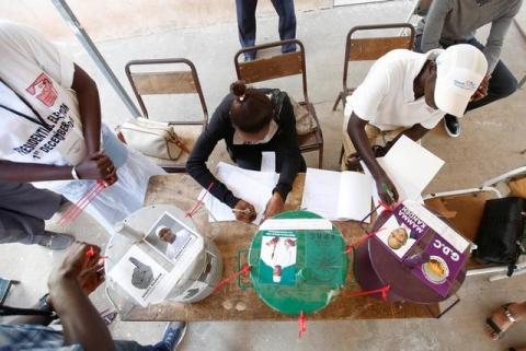 Poll workers register voters during the presidential election in Banjul, Gambia, December 1, 2016. PHOTO BY REUTERS/Thierry Gouegnon