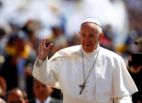 Pope Francis waves as he arrives to lead special audience for Catholic Action members in St. Peter's Square at the Vatican, April 30, 2017. PHOTO BY REUTERS/Tony Gentile