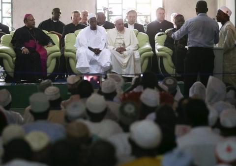 Pope Francis (centre, R) attends next to Tidiani Moussa Naibi Imam (centre, L) of the Koudoukou Mosque in Bangui, Central African Republic, November 30, 2015. PHOTO BY REUTERS/Stefano Rellandini