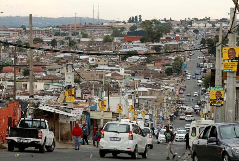 African National Congress (ANC) election posters are seen on street poles in Alexandra township, in Johannesburg, South Africa, April 10, 2019. PHOTO BY REUTERS/Siphiwe Sibeko