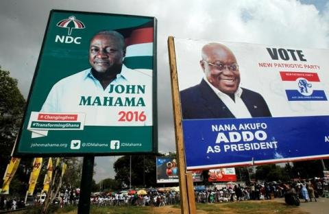 A campaign billboard shows John Dramani Mahama, Ghana's president and National Democratic Congress (NDC) presidential candidate, and the opposition New Patriotic Party (NPP) presidential candidate Nana Addo on a street in Accra, December 3, 2016. PHOTO BY REUTERS/Luc Gnago