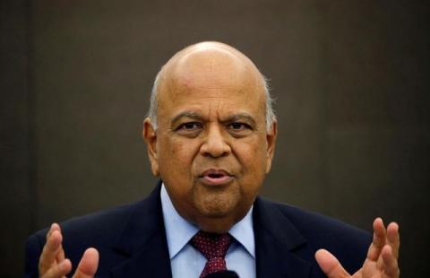 South African Finance Minister Pravin Gordhan gestures during a media briefing in Sandton near Johannesburg, March 14, 2016. PHOTO BY REUTERS/Siphiwe Sibeko