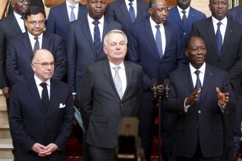 French Interior Minister Bernard Cazeneuve (L), French Foreign Minister Jean-Marc Ayrault (C) and Ivory Coast President Alassane Ouattara (R) are seen during a press conference at presidential palace in Abidjan, Ivory Coast, March 15, 2016. PHOTO BY REUTERS/Thierry Gouegnon