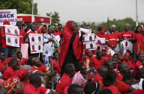 A protester addresses the "Bring Back Our Girls" protest group as they march to the presidential villa to deliver a protest letter to Nigeria's President Goodluck Jonathan in Abuja, calling for the release of the Nigerian schoolgirls in Chibok who were kidnapped by Islamist militant group Boko Haram