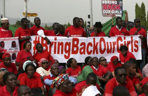 The Abuja wing of the "Bring Back Our Girls" protest group prepare to march to the presidential villa to deliver a protest letter to Nigeria's President Goodluck Jonathan in Abuja, calling for the release of the Nigerian schoolgirls in Chibok who were kidnapped by Islamist militant group Boko Haram