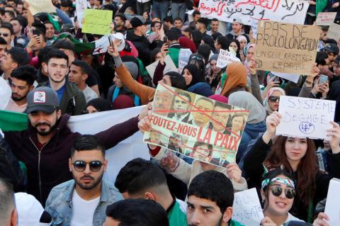 People take part in a protest demanding immediate political change in Algiers, Algeria, March 12, 2019. PHOTO BY REUTERS/Zohra Bensemra