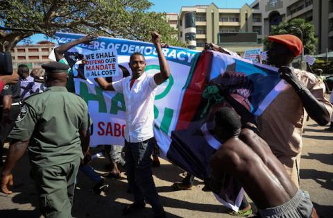 Pro-government protesters disrupt a freedom rally in Abuja, Nigeria, December 23, 2019. PHOTO BY REUTERS/Afolabi Sotunde