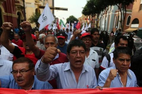 People take part in a protest against corruption in Lima, Peru after a scandal involving bribes Brazil's Odebrecht distributed in Peru, February 16, 2017. PHOTO BY REUTERS/Guadalupe Pardo