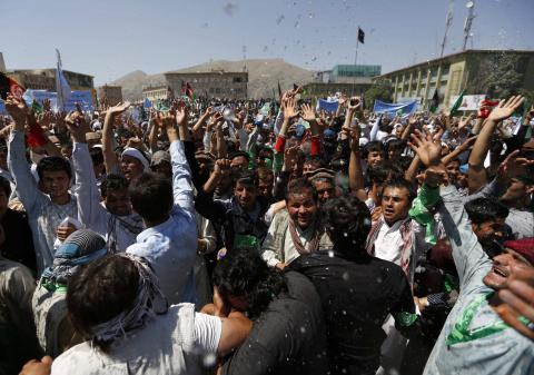 Afghans shout slogans during a protest to support presidential candidate Abdullah Abdullah, in Kabul