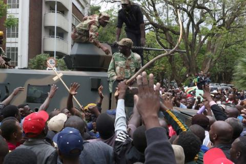 Protesters calling for Zimbabwean President Robert Mugabe to step down take to the streets in Harare, Zimbabwe, November 18, 2017. PHOTO BY REUTERS/Philimon Bulawayo