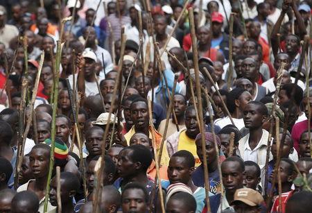 Protesters who are against Burundi President Pierre Nkurunziza and his bid for a third term march towards the town of Ijenda, Burundi, June 3, 2015. PHOTO BY REUTERS/Goran Tomasevic