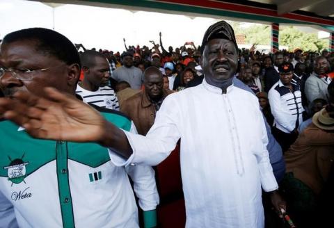 Leaders of Kenya's opposition Coalition for Reforms and Democracy (CORD), Raila Odinga (R) and Moses Wetangula (L) arrive at a rally to mark Kenya's Madaraka Day, the 53rd anniversary of the country's self rule, at Uhuru Park grounds in Nairobi, Kenya, June 1, 2016. PHOTO BY REUTERS/Goran Tomasevic