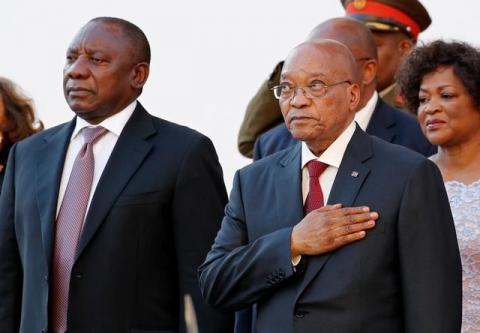 South Africa's Deputy President Cyril Ramaphosa (L) and President Jacob Zuma listen to the national anthem at the opening of Parliament in Cape Town, South Africa, February 11, 2016. PHOTO BY REUTERS/Mike Hutchings