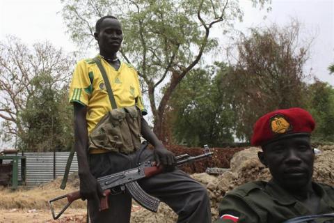 Members of anti-government forces pose for a photo in the town of Malakal, Upper Nile State, which is currently held by anti-government forces