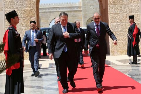 Jordanian Foreign Minister Ayman Safadi receives U.S. Secretary of State Mike Pompeo before meeting with Jordan's King Abdullah II at the Royal Palace in Amman, Jordan, April 30, 2018. PHOTO BY REUTERS/Khalil Mazraawi