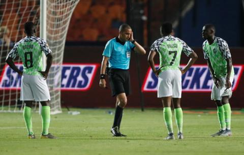 Referee Jiyed Redouane during a VAR review before awarding a goal to South Africa. PHOTO BY REUTERS/Amr Abdallah Dalsh